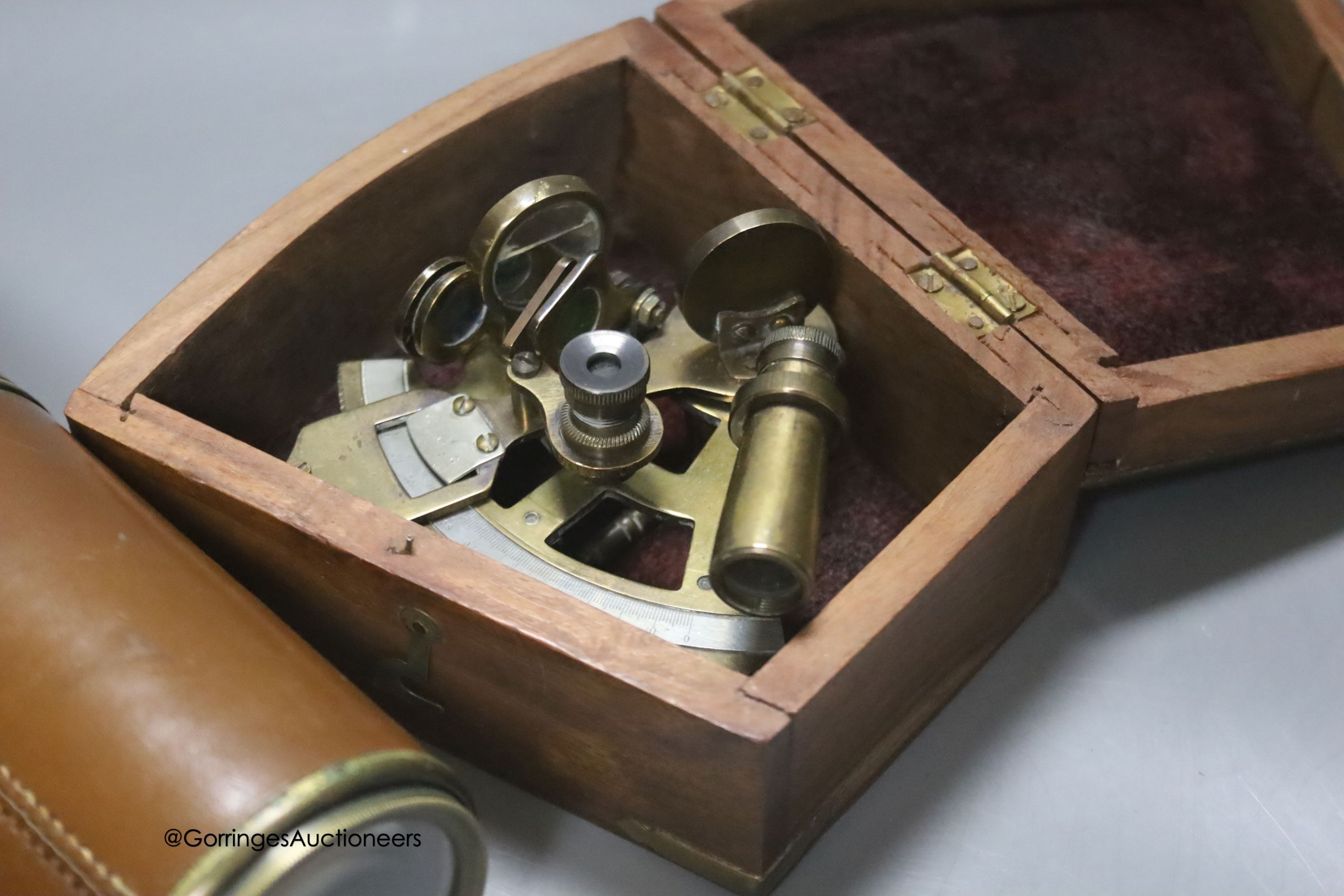 A Stanley sextant, 1884 and a Broadhurst Clarkson & Co. three-draw spotting telescope with calf grip and case